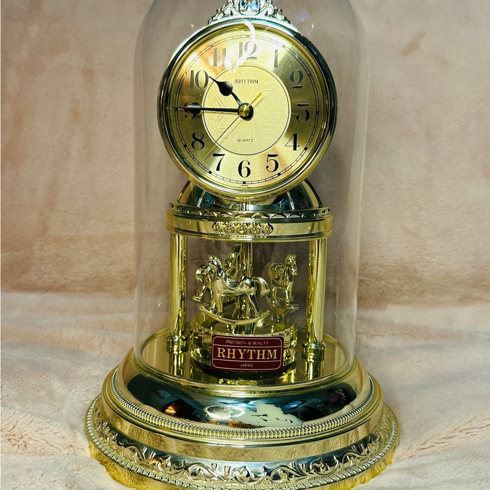 Rhythm Gold Carousel Dome Clock with Rotating Horses